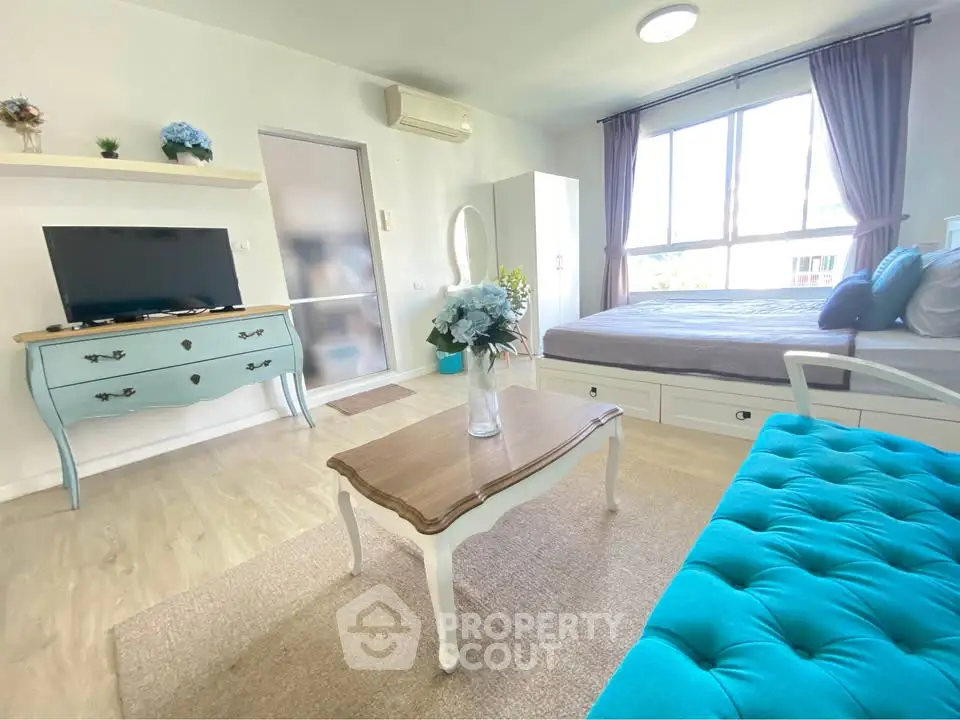 Charming studio apartment with stylish decor and natural light
