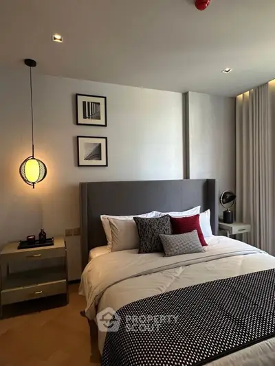 Luxurious modern bedroom with stylish decor and cozy ambiance, perfect for relaxation and comfort.