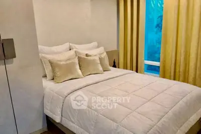 Cozy bedroom with elegant decor and large window view