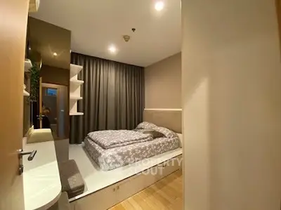 Cozy modern bedroom with built-in storage and stylish decor