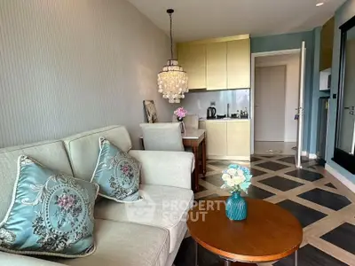 Chic living room with elegant decor and modern kitchen in stylish apartment