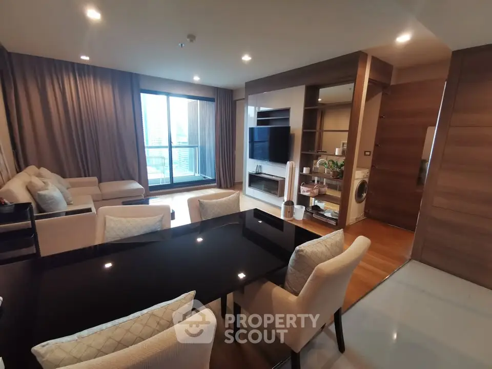 Spacious modern living room with elegant dining area and large windows