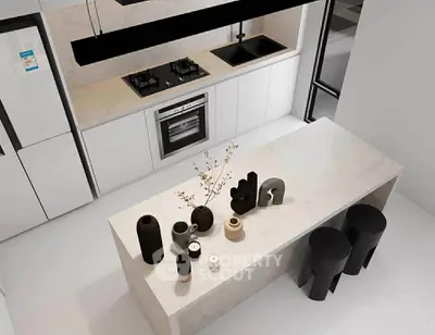 Modern kitchen with sleek design, featuring a gas stove, oven, and stylish island with decorative vases.