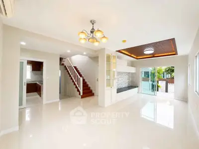 Spacious modern living room with open layout and elegant lighting