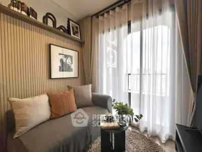 Cozy living room with elegant decor and balcony view, perfect for relaxation and entertaining.