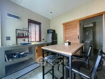 Modern kitchen with sleek design and high table seating