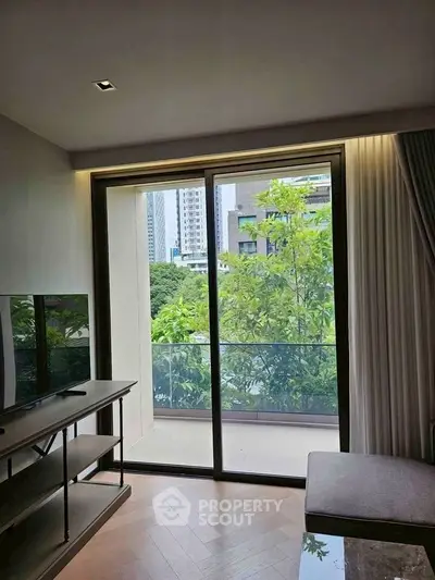 Modern living room with balcony view in urban apartment