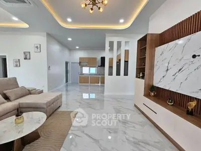 Luxurious modern living room with open kitchen and elegant marble flooring