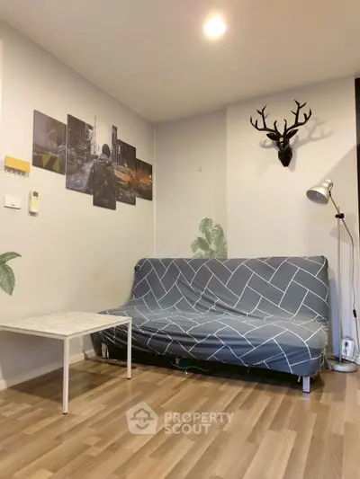 Cozy living room with modern decor and stylish wall art