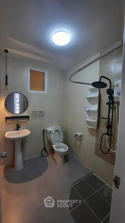 Modern bathroom with sleek fixtures and stylish shower area