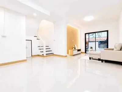 Spacious modern living room with sleek design and natural light