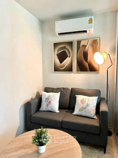 Cozy living room with modern decor and air conditioning