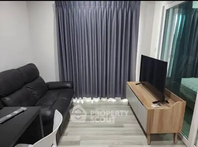 Cozy living room with modern decor and sleek furnishings