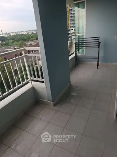 Spacious balcony with scenic view in modern apartment