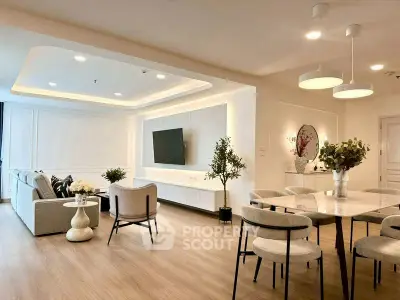 Spacious modern living room with elegant dining area and stylish decor