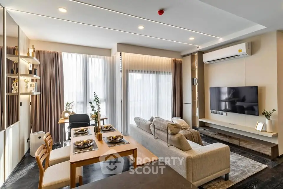 Modern living room with stylish decor, open layout, and natural light