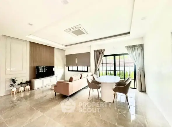 Spacious modern living room with elegant decor and natural light