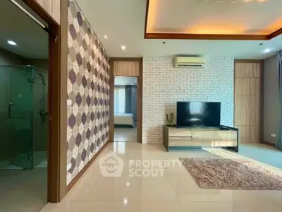 Spacious modern living room with stylish decor and natural light