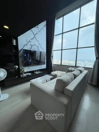 Luxurious living room with panoramic city view and modern decor