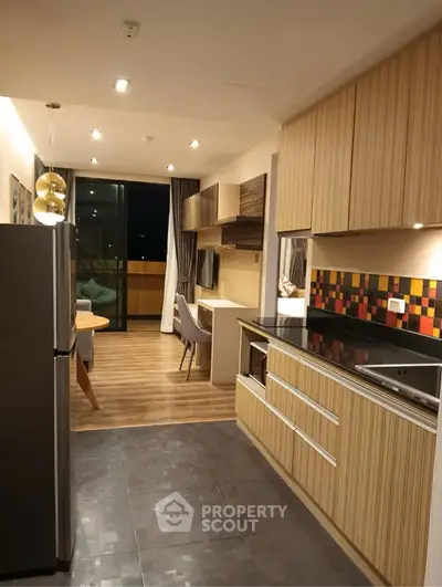Modern kitchen with open layout and stylish dining area