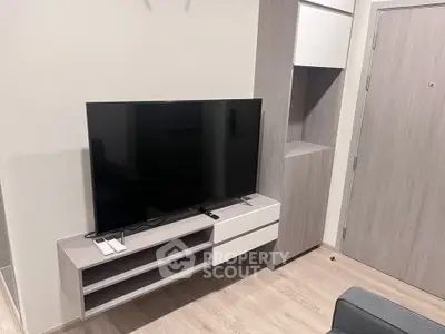 Modern living room with sleek TV unit and minimalist design