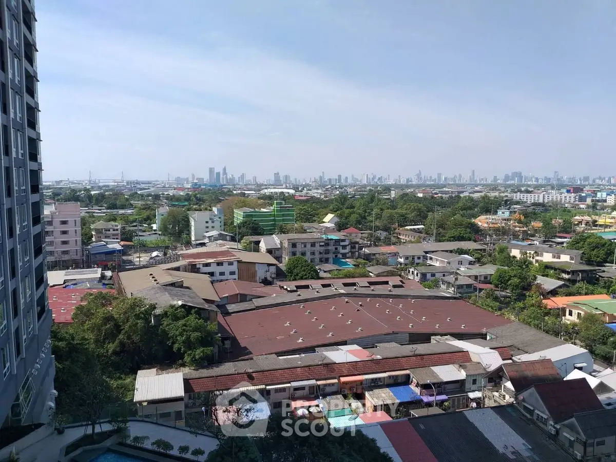 Stunning cityscape view from high-rise building overlooking urban landscape and skyline.