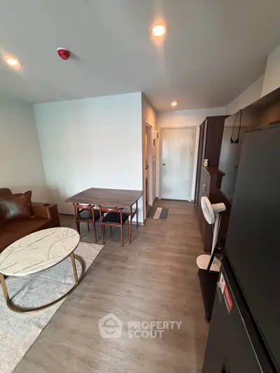Modern living room with stylish furniture and open layout in a contemporary apartment.