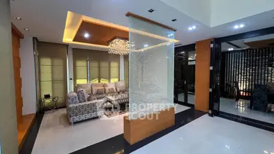 Luxurious living room with modern decor and elegant lighting