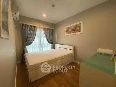 Cozy bedroom with modern decor and natural light