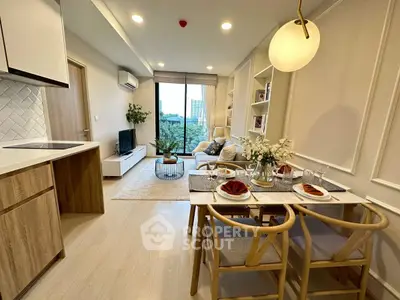 Modern open-plan living room with stylish dining area and natural light