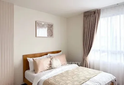 Cozy bedroom with elegant decor and natural light
