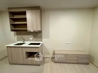 Modern minimalist kitchen with wooden cabinets and sleek design