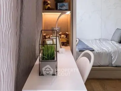 Modern study area with sleek desk and cozy bedroom view