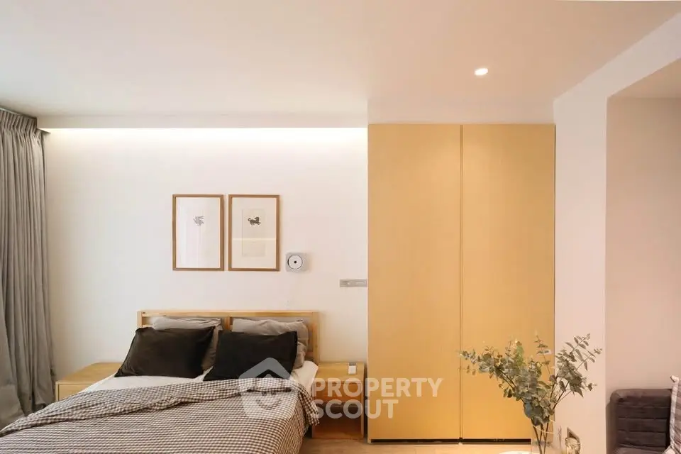 Modern bedroom with cozy bed and minimalist decor