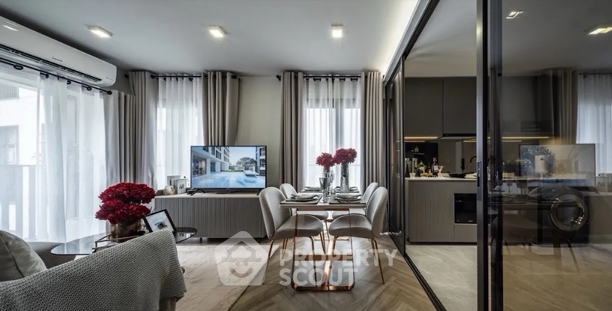 Modern living room with elegant dining area and stylish decor