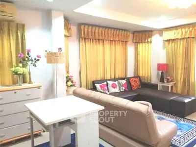 Spacious living room with elegant decor and comfortable seating