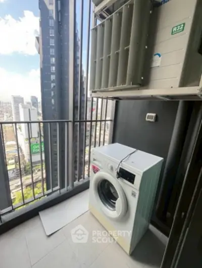 High-rise balcony with city view and washing machine, perfect for urban living.