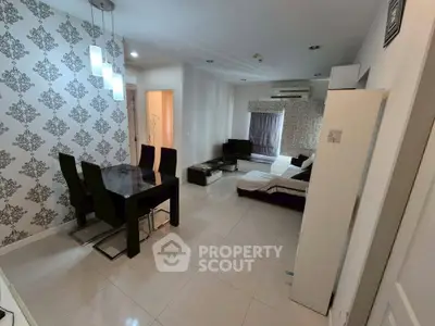 Modern living room with elegant dining area and stylish decor