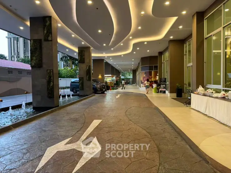 Luxurious building entrance with modern lighting and elegant design
