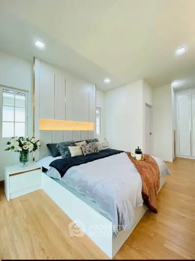 Luxurious modern bedroom with elegant decor and cozy ambiance