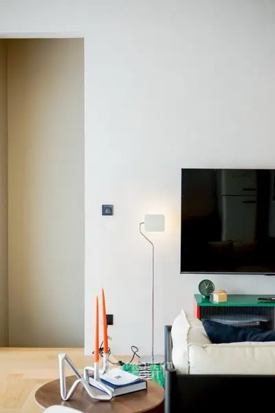 Modern living room with sleek TV setup and stylish decor