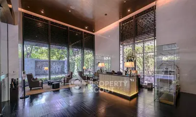 Luxurious modern lobby with high ceilings and elegant decor