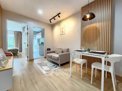 Modern living room with cozy dining area and stylish decor