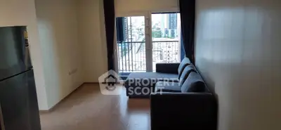 Modern living room with city view and cozy sofa, perfect for urban living.