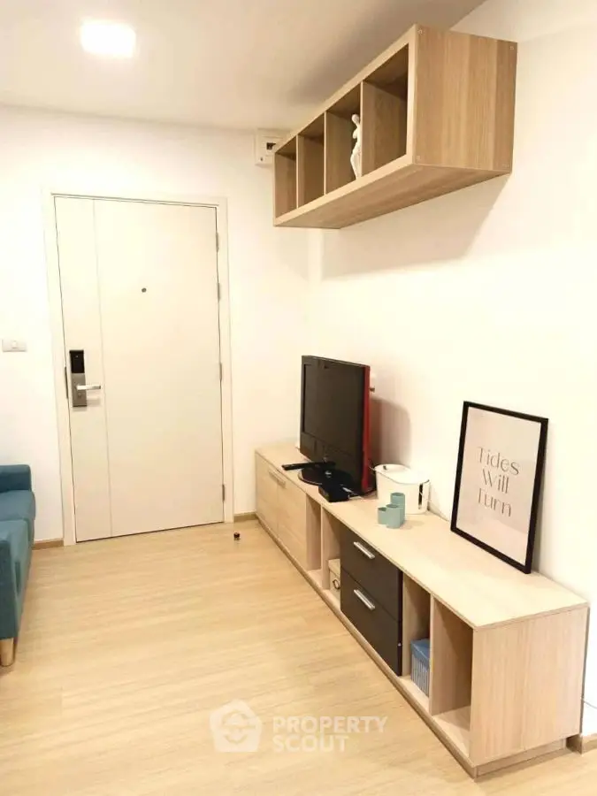 Modern living room with stylish TV stand and wall-mounted shelves