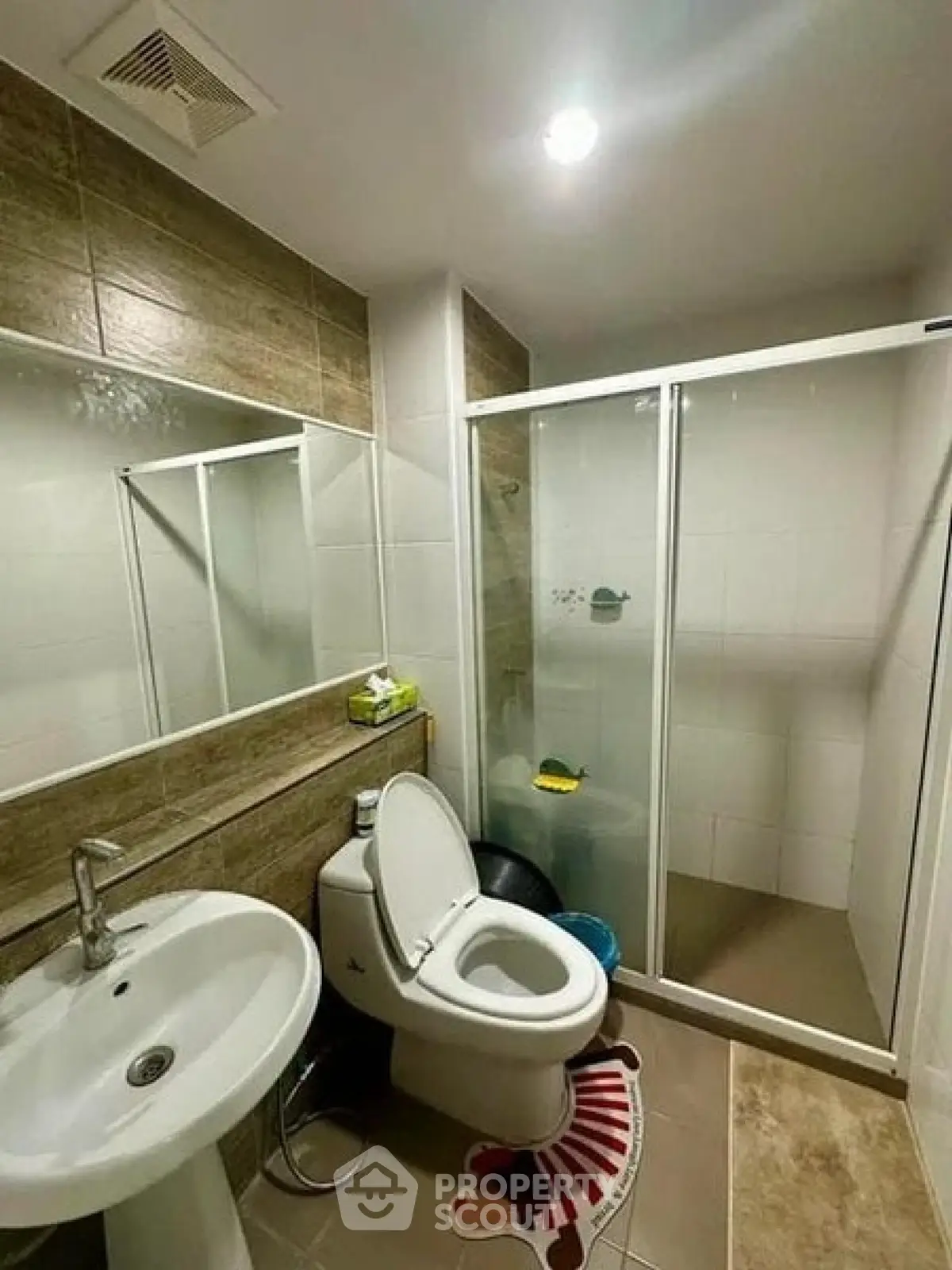 Modern bathroom with shower enclosure and stylish tile design