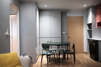 Modern apartment interior with stylish dining area and sleek furniture