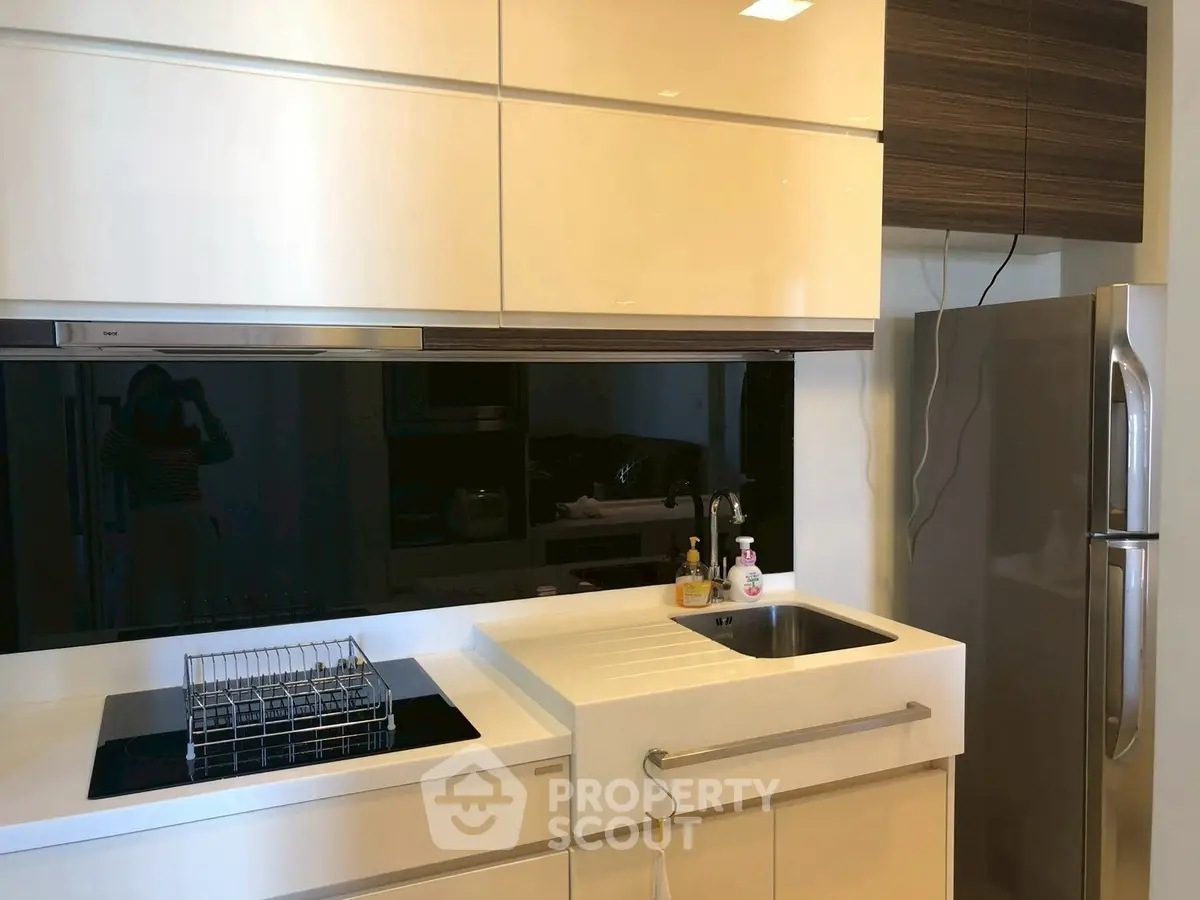 Modern kitchen with sleek appliances and minimalist design