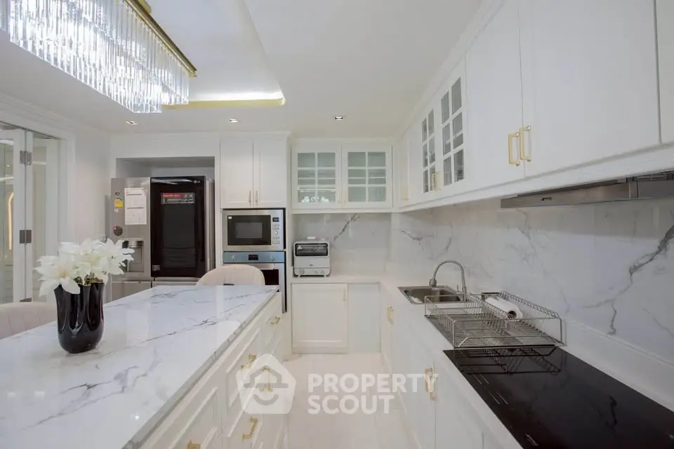 Luxurious modern kitchen with marble countertops and high-end appliances