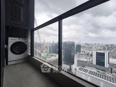 Stunning city view from high-rise balcony with washing machine